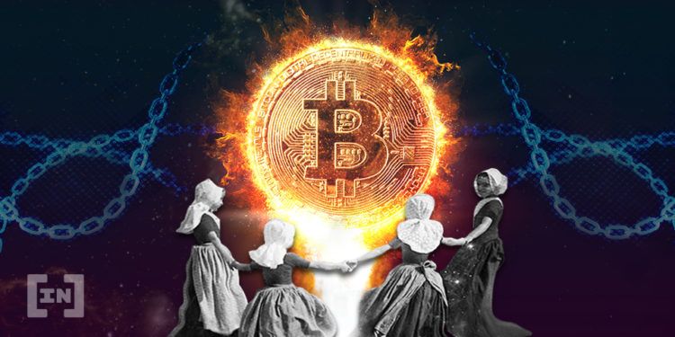 Frauen tanzen um eine Bitcoin Münze